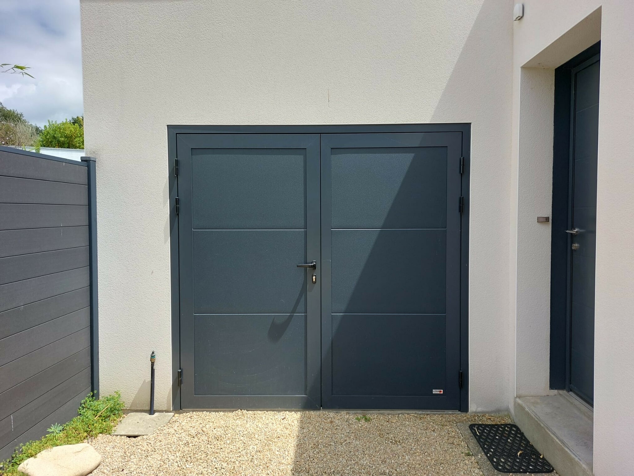 Installation porte de garage 2 vantaux - Vannes
